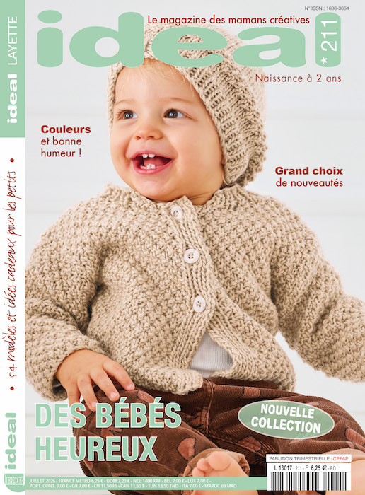 Couverture du magazine Idéal Layette n°211 « Des bébés heureux », montrant un bébé souriant coiffé d'un bonnet en tricot et portant un gilet beige chiné, avec mentions « Couleurs et bonne humeur » et « Grand choix de nouveautés ».